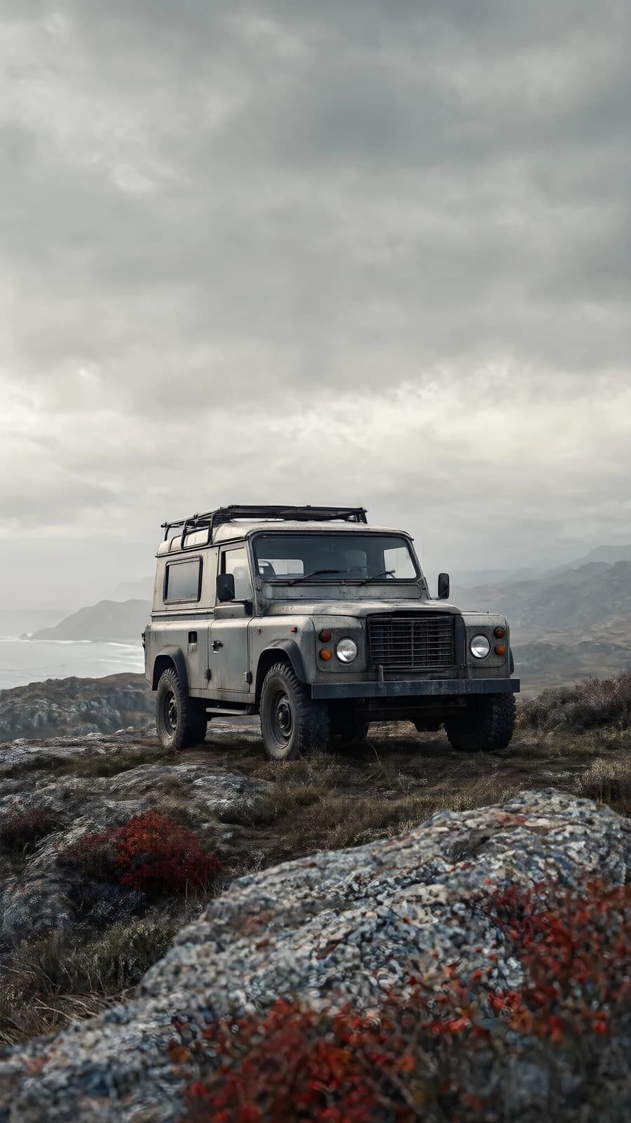 Off-road vehicle on a rocky ridge